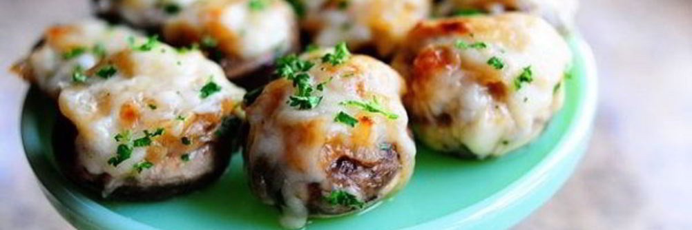 Шампиньоны под сыром в духовке