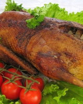 Утка, фаршированная грибами и картофелем