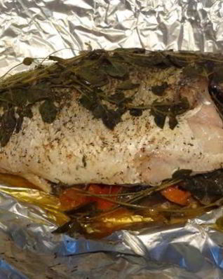 Дорада, фаршированная овощами и орегано по-канарски