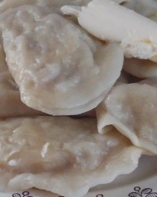 Вареники с квашеной капустой и мясом