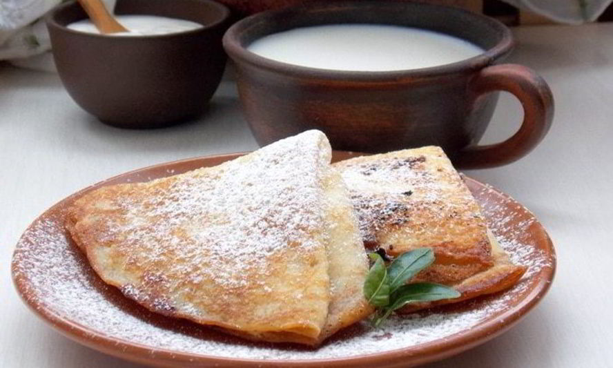 Рецепт блинчиков с творогом, изюмом и апельсиновой цедрой