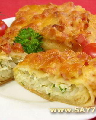 Фаршированные блины, запеченные с ветчиной и сыром