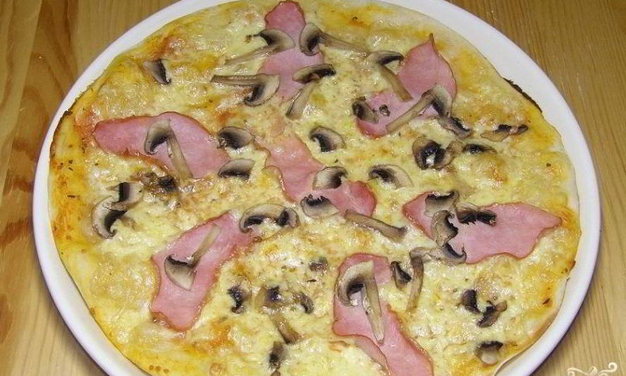 Рецепт пиццы с ветчиной и шампиньонами