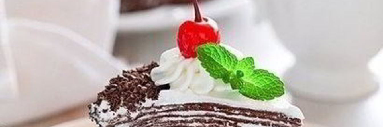 Торт из шоколадный блинчиков со сливочно-шоколадным кремом